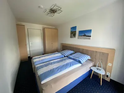 Ein Bett oder Betten in einem Zimmer der Unterkunft Meehrblick