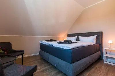 Ein Bett oder Betten in einem Zimmer der Unterkunft FeWo Paluc
