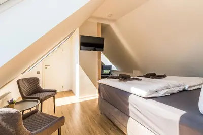 Ein Bett oder Betten in einem Zimmer der Unterkunft FeWo Paluc