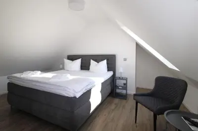Ein Bett oder Betten in einem Zimmer der Unterkunft FeWo Paluc