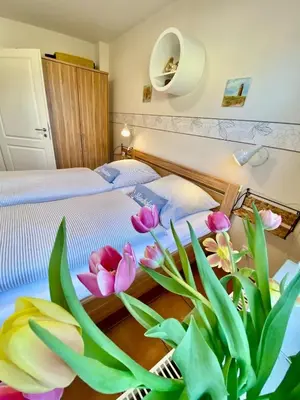 Ein Bett oder Betten in einem Zimmer der Unterkunft FW Sonne