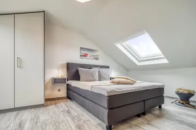 Ein Bett oder Betten in einem Zimmer der Unterkunft Leuchtfeuer - a62122