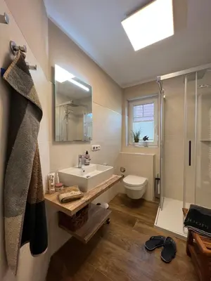 Ein Badezimmer in der Unterkunft Ferienwohnung Baumann Haus Meer