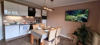 Küche/Küchenzeile in der Unterkunft Ferienwohnung Baumann Haus Meer