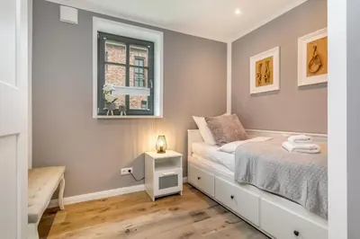 Ein Bett oder Betten in einem Zimmer der Unterkunft Achterliek