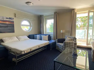 Ein Bett oder Betten in einem Zimmer der Unterkunft Am Kurhaus 325
