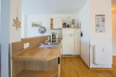 Küche/Küchenzeile in der Unterkunft Ferienwohnung Sanddorn direkt hinter den Dünen