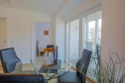 Ein Sitzbereich in der Unterkunft Ferienwohnung Sanddorn direkt hinter den Dünen