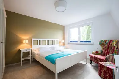 Ein Bett oder Betten in einem Zimmer der Unterkunft Seemannsgarn