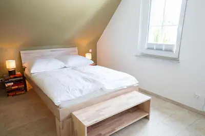 Ein Bett oder Betten in einem Zimmer der Unterkunft Seemannsgarn