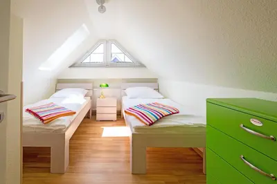 Ein Bett oder Betten in einem Zimmer der Unterkunft Seemannsgarn