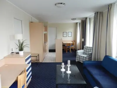 Ein Sitzbereich in der Unterkunft Apartment 208 - Ostseeblick - a21142