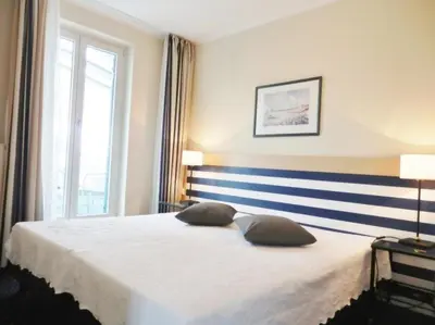 Ein Bett oder Betten in einem Zimmer der Unterkunft Apartment 208 - Ostseeblick - a21142