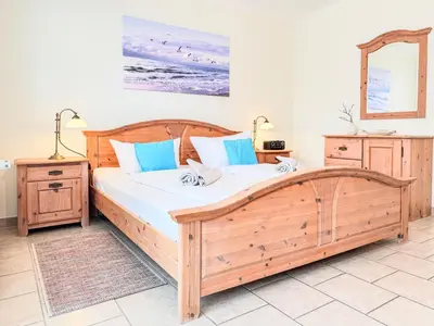Ein Bett oder Betten in einem Zimmer der Unterkunft Silbermöwe