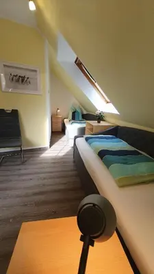 Ein Bett oder Betten in einem Zimmer der Unterkunft Am Deich 30 Strandadler Zingst - a63779