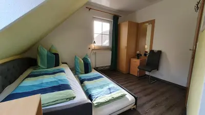 Ein Bett oder Betten in einem Zimmer der Unterkunft Am Deich 30 Strandadler Zingst - a63779