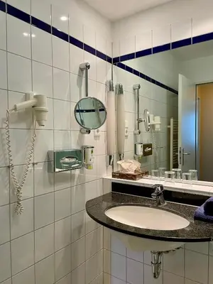 Ein Badezimmer in der Unterkunft Küstenfeuer