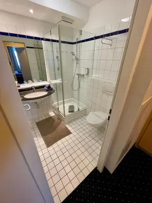 Ein Badezimmer in der Unterkunft Küstenfeuer