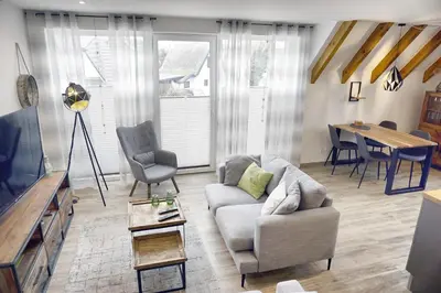 Ein Sitzbereich in der Unterkunft Haus Seevogel - Suite Kranich - a57544