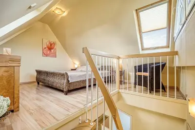Ein Bett oder Betten in einem Zimmer der Unterkunft Hoppenberg 22, Whg 2