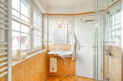 Ein Badezimmer in der Unterkunft Hoppenberg 22, Whg 2