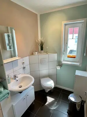 Ein Badezimmer in der Unterkunft Ferienzimmer/wohnung am Kurstrand, WLAN