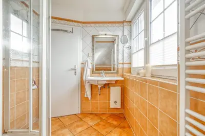 Ein Badezimmer in der Unterkunft Hoppenberg 22, Whg 3