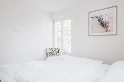 Ein Bett oder Betten in einem Zimmer der Unterkunft Ostseehaus Ostseehaus 2