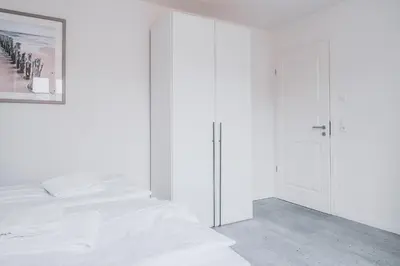 Ein Bett oder Betten in einem Zimmer der Unterkunft Ostseehaus Ostseehaus 2