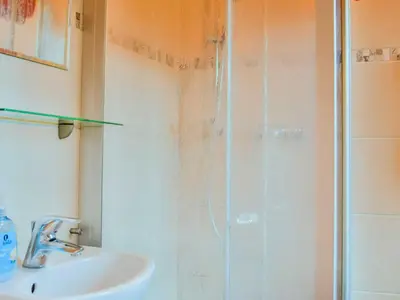 Ein Badezimmer in der Unterkunft Ferienhaus Bodden