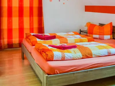 Ein Bett oder Betten in einem Zimmer der Unterkunft Ferienhaus Bodden