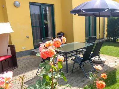 Ein Garten an der Unterkunft Ferienhaus Bodden