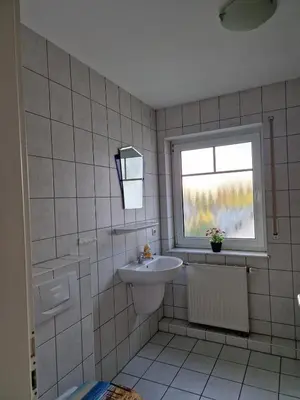 Ein Badezimmer in der Unterkunft Darßer Weg 32a 
