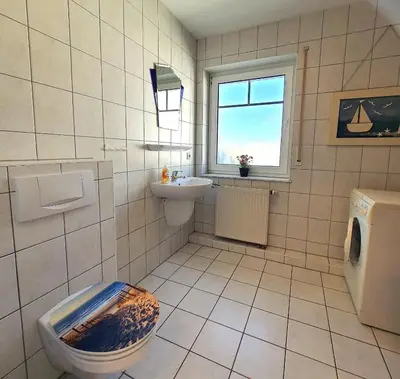 Ein Badezimmer in der Unterkunft Darßer Weg 32a 