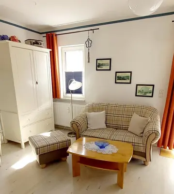Ein Sitzbereich in der Unterkunft Studio 5 im EG Haus Stranddistel, wunderschones Studio fur 2 Personen in Zingst