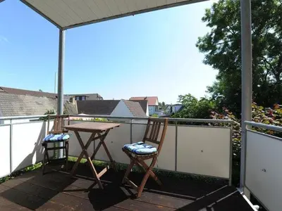 Ein Balkon oder eine Terrasse in der Unterkunft Studio 8 im 1 OG Haus Stranddistel, schones Studio fur 2 Personen in Zingst, Hund erlaubt