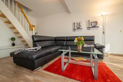 Ein Sitzbereich in der Unterkunft Wohnung 16 im 2 OG Haus Stranddistel, moderne Ferienwohnung fur 4 Personen in Zingst