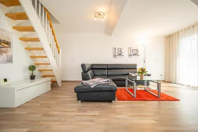 Ein Sitzbereich in der Unterkunft Wohnung 16 im 2 OG Haus Stranddistel, moderne Ferienwohnung fur 4 Personen in Zingst