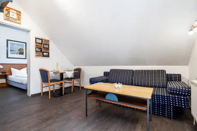 Ein Sitzbereich in der Unterkunft Ferienwohnung 