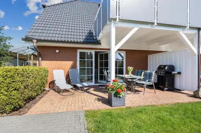 Ein Garten an der Unterkunft Zum Fährmann 2 Whg 1 EG links in 18356 Pruchten