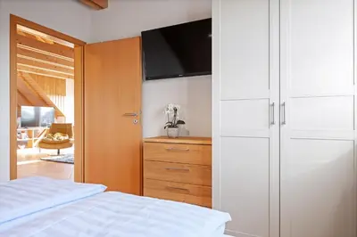 Ein Bett oder Betten in einem Zimmer der Unterkunft Zum Fährmann 2 Whg 3 im OG in 18356 Pruchten