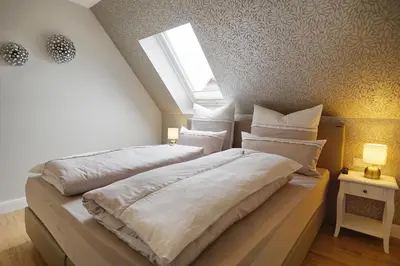 Ein Bett oder Betten in einem Zimmer der Unterkunft Ostseerauschen