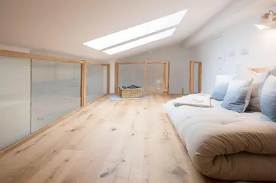 Ein Bett oder Betten in einem Zimmer der Unterkunft Ferienwohnung Strandgut Sonnenseite