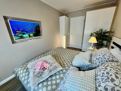 Ein Bett oder Betten in einem Zimmer der Unterkunft Ferienwohnung Nr 128 Zur Seebrucke