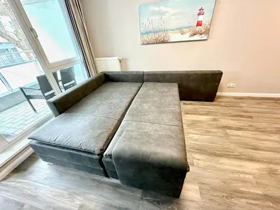 Ein Sitzbereich in der Unterkunft Ferienwohnung Nr 128 Zur Seebrucke