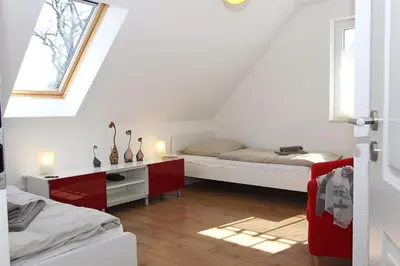 Ein Bett oder Betten in einem Zimmer der Unterkunft Ferienhaus 3f
