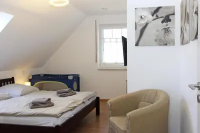 Ein Bett oder Betten in einem Zimmer der Unterkunft Ferienhaus 3f