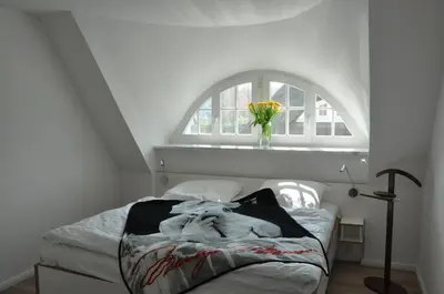 Ein Bett oder Betten in einem Zimmer der Unterkunft Ferienhaus Haubenlerche 63 - Haus Marilyn