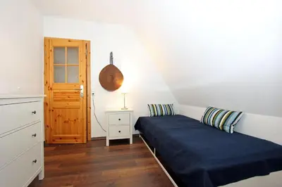 Ein Bett oder Betten in einem Zimmer der Unterkunft Reethus