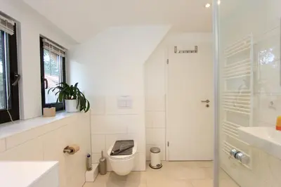 Ein Badezimmer in der Unterkunft Brücke im Reethus